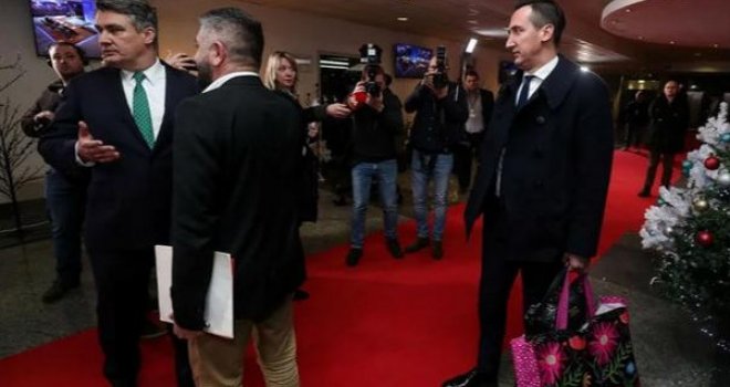 Pogledajte napad savjetnika Kolinde Grabar Kitarović na Zorana Milanovića nakon debate: Cvijetna torbica postala hit!